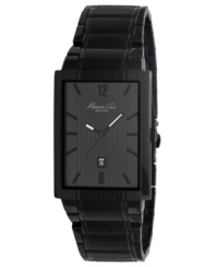 Superhero style from Kenneth Cole New York. Sleek watch crafted of black ion-plated stainless steel bracelet and rectangular case. Black dial with vertically-striped texture features applied numerals at twelve and six o'clock, stick indices, date window at six o'clock, three hands and logo. Quartz movement. Water resistant to 30 meters. Limited lifetime warranty. Superhero style from Kenneth Cole New York. Sleek watch crafted of black ion-plated stainless steel bracelet and rectangular case. Black dial with vertically-striped texture features applied numerals at twelve and six o'clock, stick indices, date window at six o'clock, three hands and logo. Quartz movement. Water resistant to 30 meters. Limited lifetime warranty.
