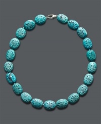 Add a little color and class. This stunning carved necklace adds a vivid pop to your look with bright turquoise beads (14 mm) and a sterling silver clasp. Approximate length: 18 inches. Add a little color and class. This stunning carved necklace adds a vivid pop to your look with bright turquoise beads (14 mm) and a sterling silver clasp. Approximate length: 18 inches.
