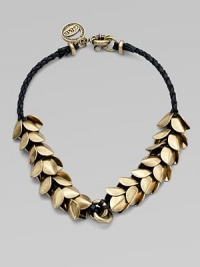 A braided leather rope with a cascading layer of petals make this an eye-catching piece. LeatherAntique-finished brassLength, about 18Spring ring closureImported A braided leather rope with a cascading layer of petals make this an eye-catching piece. LeatherAntique-finished brassLength, about 18Spring ring closureImported
