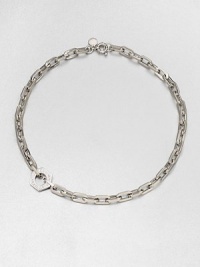 A logo accented nut sits off-center on a narrow, chain link design. Rhodium-plated brassLength, about 19Pendant size, about .75Spring ring closureImported 