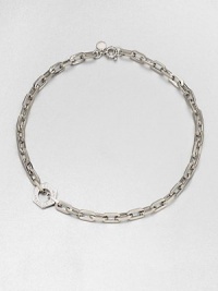 A logo accented nut sits off-center on a narrow, chain link design. Rhodium-plated brassLength, about 19Pendant size, about .75Spring ring closureImported A logo accented nut sits off-center on a narrow, chain link design. Rhodium-plated brassLength, about 19Pendant size, about .75Spring ring closureImported