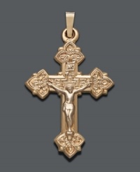 Cherish your beliefs by wearing them proudly. Intricate cross pendant features a scrolling design crafted in 14k gold. Approximate drop width: 3/4 inch. Approximate drop length: 1-1/4 inches. Cherish your beliefs by wearing them proudly. Intricate cross pendant features a scrolling design crafted in 14k gold. Approximate drop width: 3/4 inch. Approximate drop length: 1-1/4 inches.
