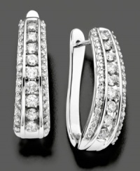 Dangling elegance with an abundance of shine. These stunning diamond earrings feature round-cut diamonds (1 ct. t.w.) set in 14k white gold. Approximate drop: 3/4 inch. Dangling elegance with an abundance of shine. These stunning diamond earrings feature round-cut diamonds (1 ct. t.w.) set in 14k white gold. Approximate drop: 3/4 inch.