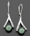Exotic Tahitian pearls (8-9 mm) dangle elegantly from a unique setting of 14k white gold studded with diamond accents on these beautiful drop earrings. Approximate drop: 1-1/2 inches.