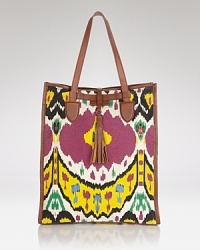 For the boho babe: this Isabella Fiore tote flaunts a free spirited vibe, crafted of a mix of canvas and leather. Plus, it is perfectly proportioned to throw over your shoulder and go. For the boho babe: this Isabella Fiore tote flaunts a free spirited vibe, crafted of a mix of canvas and leather. Plus, it is perfectly proportioned to throw over your shoulder and go.