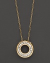 A dazzling circle of diamond baguettes, set in gleaming 14K yellow gold.