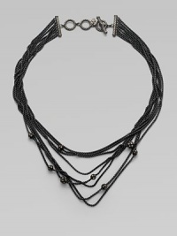 From the Starlight Collection. Multi strands of blackened sterling silver in graduated lengths, punctuated by beads set with shimmering diamonds.Diamonds, 1.11 tcwSterling silverLength, about 16½-18½Adjustable cable toggle closureImported From the Starlight Collection. Multi strands of blackened sterling silver in graduated lengths, punctuated by beads set with shimmering diamonds.Diamonds, 1.11 tcwSterling silverLength, about 16½-18½Adjustable cable toggle closureImported