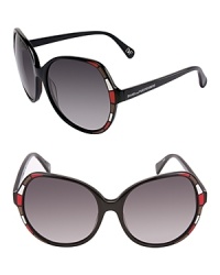 A mosiac of color adorns the frames of these chic sunglasses by DIANE von FURSTENBERG. A mosiac of color adorns the frames of these chic sunglasses by DIANE von FURSTENBERG.