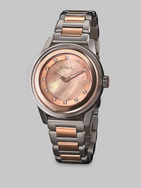 From the Orchestra Collection. A contrasting, statement design in a modern rose gold and sleek stainless steel with dazzling Swarovski crystal markers. Quartz movementWater resistant to 10 ATMRound stainless steelcase, 40mm (1.5) Rose goldtone ion-plated stainless steel bezelRose mother-of-pearl dialSwarovski crystal markersStainless steel and rose goldtone ion-plated stainless steel link braceletImported From the Orchestra Collection. A contrasting, statement design in a modern rose gold and sleek stainless steel with dazzling Swarovski crystal markers. Quartz movementWater resistant to 10 ATMRound stainless steelcase, 40mm (1.5) Rose goldtone ion-plated stainless steel bezelRose mother-of-pearl dialSwarovski crystal markersStainless steel and rose goldtone ion-plated stainless steel link braceletImported