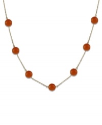 A few carnelian gems (10 mm) collect across a 14k gold chain to create the perfect necklace to add a little pop of color to your wardrobe. Approximate length: 16 inches. A few carnelian gems (10 mm) collect across a 14k gold chain to create the perfect necklace to add a little pop of color to your wardrobe. Approximate length: 16 inches.