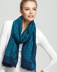 Tory Burch's iconic T is beautifully represented in this patterned oblong scarf. Tory Burch's iconic T is beautifully represented in this patterned oblong scarf.
