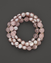 Softly shimmering pearls mingle with rose quartz. Softly shimmering pearls mingle with rose quartz.