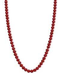 Crimson chic. This brilliantly-hued strand necklace features bold red agate beads (150 ct. t.w.) in a polished 14k gold setting. Approximate length: 18 inches. Approximate bead diameter: 7 mm. Crimson chic. This brilliantly-hued strand necklace features bold red agate beads (150 ct. t.w.) in a polished 14k gold setting. Approximate length: 18 inches. Approximate bead diameter: 7 mm.