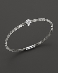 From the Classique Collection, a stackable bangle in white gold and stainless steel with diamond stations. Designed by Charriol. From the Classique Collection, a stackable bangle in white gold and stainless steel with diamond stations. Designed by Charriol.
