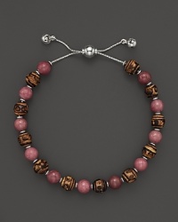 Bamboo and rhodonite beads make a vibrant pairing on this timeless Gucci bracelet. Bamboo and rhodonite beads make a vibrant pairing on this timeless Gucci bracelet.