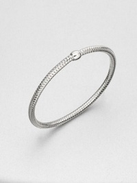 A simple, yet beautiful design with a single bead on a textured mesh bangle. 18k white goldLength, about 7Slip-on designMade in Italy A simple, yet beautiful design with a single bead on a textured mesh bangle. 18k white goldLength, about 7Slip-on designMade in Italy