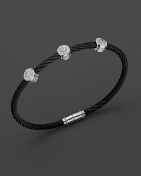 From the Celtic Noir Collection, a stackable bangle in white gold and black PVD cable with diamond stations. Designed by Charriol. From the Celtic Noir Collection, a stackable bangle in white gold and black PVD cable with diamond stations. Designed by Charriol.