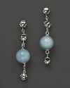 Bold sterling silver earrings set with aquamarine showcase Di MODOLO's unique Triadra cages.
