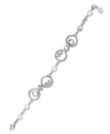 It's crystal clear that this beautiful, Beads Bracelet  from Swarovski will have an an elegant effect however you wear it! Embellished with crystal beading and bezel-set crystals, it's crafted in silver tone mixed metal with a secure lobster clasp. Approximate length: 7-1/4 inches.