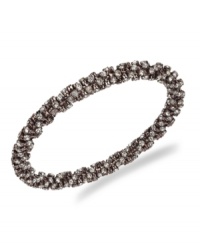 Add a little illumination. Sparkling glass stones and a chic, twisted design create an impressive design on Alfani's pretty bracelet. Set in bronze tone mixed metal. Approximate diameter: 2-3/4 inches. Add a little illumination. Sparkling glass stones and a chic, twisted design create an impressive design on Alfani's pretty bracelet. Set in bronze tone mixed metal. Approximate diameter: 2-3/4 inches.