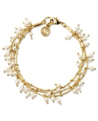 Three's the magic number. Anne Klein's three-row stretch bracelet decorates your wrists with pretty plastic pearls. Crafted in gold tone mixed metal. Stretches to fit wrist. Approximate length: 7-3/4 inches. Three's the magic number. Anne Klein's three-row stretch bracelet decorates your wrists with pretty plastic pearls. Crafted in gold tone mixed metal. Stretches to fit wrist. Approximate length: 7-3/4 inches.
