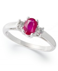 Royally charming. This royalty-inspired ring features an oval-cut ruby (1/2 ct. t.w.) surrounded on either side by round-cut diamonds (1/8 ct. t.w). Set in 14k white gold. Royally charming. This royalty-inspired ring features an oval-cut ruby (1/2 ct. t.w.) surrounded on either side by round-cut diamonds (1/8 ct. t.w). Set in 14k white gold.