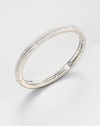 Double rows of sparkling pavé crystals encircle a classic hinged bangle with a modern square-edged design.CrystalRhodium platingDiameter, about 2½Width, about ¼Box-and-tongue claspImported