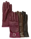 Contrast colored piping lends a fashion-forward touch to luxe leather gloves from Labonia, lined in soft cashmere.