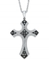 A stunning cross pendant with medieval flair. Set in sterling silver with touches of black rhodium, this cross glistens with the addition of round-cut diamonds (1/4 ct. t.w.). Approximate length: 18 inches. Approximate drop: 1-1/2 inches.