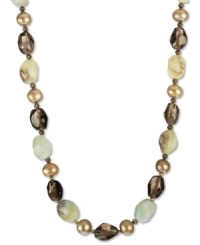 Earthy elements combine for a bohemian vibe. This pretty necklace features bronze-colored cultured freshwater pearls (9-10mm), smokey quartz (109-1/3 ct. t.w.), blue opals (122-3/8 ct. t.w.), and Swarovski Elements. Set in 18k gold over sterling silver. Approximate length: 17 inches. Earthy elements combine for a bohemian vibe. This pretty necklace features bronze-colored cultured freshwater pearls (9-10mm), smokey quartz (109-1/3 ct. t.w.), blue opals (122-3/8 ct. t.w.), and Swarovski Elements. Set in 18k gold over sterling silver. Approximate length: 17 inches.