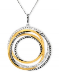 A shapely mix of sparkle and shine. Genevieve & Grace's chic circular pendant features a graduated design in sterling silver and 18k gold over sterling silver with glittering marcasite accents. Approximate length: 17 inches. Approximate drop: 1-7/8 inches. A shapely mix of sparkle and shine. Genevieve & Grace's chic circular pendant features a graduated design in sterling silver and 18k gold over sterling silver with glittering marcasite accents. Approximate length: 17 inches. Approximate drop: 1-7/8 inches.