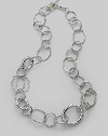 Gently hammered freeform links of sterling silver in an array of sizes and shapes give a classic chain a whole new look. Sterling silver Length, about 23 Toggle clasp Imported