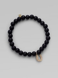 A good luck charm, depicted in diamonds set in 14k yellow gold, hangs from a simple strand of black onyx beads. Diamonds, 0.08 tcw Black onyx 14k yellow gold Diameter, about 2 Charm length, about ½ Stretch cord Imported A good luck charm, depicted in diamonds set in 14k yellow gold, hangs from a simple strand of black onyx beads. Diamonds, 0.08 tcw Black onyx 14k yellow gold Diameter, about 2 Charm length, about ½ Stretch cord Imported