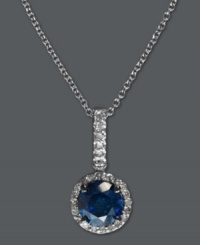 A touch of royalty. EFFY Collection's stunning drop pendant features a large round-cut blue diamond (3/4 ct. t.w.) surrounded by smaller, round-cut white diamonds (7/8 ct. t.w.). Crafted in 14k white gold. Approximate length: 18 inches. Approximate drop: 1 inch. A touch of royalty. EFFY Collection's stunning drop pendant features a large round-cut blue diamond (3/4 ct. t.w.) surrounded by smaller, round-cut white diamonds (7/8 ct. t.w.). Crafted in 14k white gold. Approximate length: 18 inches. Approximate drop: 1 inch.