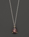 Detailed in 18K yellow gold, this Judith Ripka pear stone necklace frames a faceted raspberry crystal.