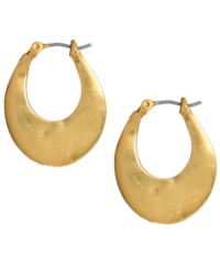 Sculpturally stylish. Kenneth Cole New York puts an artsy spin on a traditional pair of hoop earrings. Oval-shaped hoop earrings crafted in gold tone mixed metal. Approximate drop: 1 inch. Sculpturally stylish. Kenneth Cole New York puts an artsy spin on a traditional pair of hoop earrings. Oval-shaped hoop earrings crafted in gold tone mixed metal. Approximate drop: 1 inch.