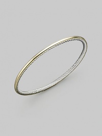From the Cable Bangle collection. A smooth 18k gold exterior meets a cabled sterling silver interior on this truly unique bracelet. 18k yellow gold Sterling silver Diameter, about 2½ Imported