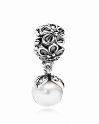 A white freshwater pearl sways delicately from a sterling silver floral charm accented with black zirconia stones. By PANDORA. A white freshwater pearl sways delicately from a sterling silver floral charm accented with black zirconia stones. By PANDORA.