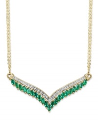 Enhance the glamour of an elegant v-neck gown. This v-shaped pendant necklace is adorned by marquise-cut emeralds (1-1/2 ct. t.w.) and a seamless row of round-cut diamonds (1/7 ct. t.w.). Crafted in 14k gold. Approximate length: 18 inches. Approximate drop length: 1 inch. Approximate drop width: 2-7/8 inches. Enhance the glamour of an elegant v-neck gown. This v-shaped pendant necklace is adorned by marquise-cut emeralds (1-1/2 ct. t.w.) and a seamless row of round-cut diamonds (1/7 ct. t.w.). Crafted in 14k gold. Approximate length: 18 inches. Approximate drop length: 1 inch. Approximate drop width: 2-7/8 inches.