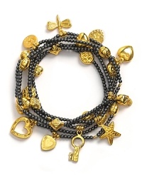 Good Charma gunmetal beaded bracelet set with gold mini charms. A set of six gunmetal and gold stretchy beaded bracelets with charms. Charms include tassel, dragonfly, wish bone, heart and key. Good Charma gunmetal beaded bracelet set with gold mini charms. A set of six gunmetal and gold stretchy beaded bracelets with charms. Charms include tassel, dragonfly, wish bone, heart and key.