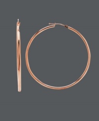 14k rose gold adds a modern hue to a timeless style. These up-to-date earrings feature a click back design and large-shaped hoop. Approximate diameter: 2 inches. 14k rose gold adds a modern hue to a timeless style. These up-to-date earrings feature a click back design and large-shaped hoop. Approximate diameter: 2 inches.