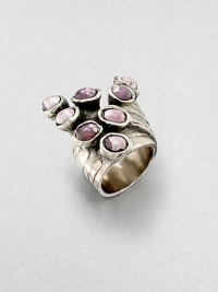 A sprinkling of vibrant color rests in a silvertone setting with the look of a modern sculpture.GlassSilvertoneDiameter, about 1.1Made in Italy and imported A sprinkling of vibrant color rests in a silvertone setting with the look of a modern sculpture.GlassSilvertoneDiameter, about 1.1Made in Italy and imported