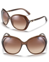 Take cover in these oversize stunners from the luxury geniuses at Jimmy Choo. Gold tone detailing at temples adds an extra does of gilded glamour. Take cover in these oversize stunners from the luxury geniuses at Jimmy Choo. Gold tone detailing at temples adds an extra does of gilded glamour.