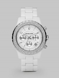 A sporty chronograph design with sparkling crystal trim along the bezel.Analog movement Water resistant to 5 ATM Swarovski crystals along bezel Round stainless steel case, 42mm, (1.65) White chronograph dial with MOP center Date display between 4 and 5 o'clock Index and Arabic numeral hour markers Second hand Acetate link bracelet Imported A sporty chronograph design with sparkling crystal trim along the bezel.Analog movement Water resistant to 5 ATM Swarovski crystals along bezel Round stainless steel case, 42mm, (1.65) White chronograph dial with MOP center Date display between 4 and 5 o'clock Index and Arabic numeral hour markers Second hand Acetate link bracelet Imported