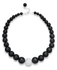 Embolden your look. Matte black agate (520 ct. t.w.) and a textured sterling silver bead make any look pop on this dramatic necklace. Beads strung on a silk cord. Approximate length: 19 inches + 3-inch extender. Embolden your look. Matte black agate (520 ct. t.w.) and a textured sterling silver bead make any look pop on this dramatic necklace. Beads strung on a silk cord. Approximate length: 19 inches + 3-inch extender.