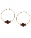 Style takes center stage in this pair of hoop earrings from Kenneth Cole New York. Crafted from gold-tone mixed metal, the earrings are offset with hematite-tone spacers surrounding red pave crystal accents for fashionable appeal. Approximate drop: 2-1/4 inches.