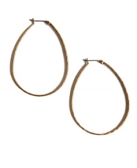 Instantly transform a dull ensemble with head-turning hoops. Lucky Brand design features an oblong-shaped hoop in gold tone mixed metal. Approximate diameter: 1-3/4 inches. Instantly transform a dull ensemble with head-turning hoops. Lucky Brand design features an oblong-shaped hoop in gold tone mixed metal. Approximate diameter: 1-3/4 inches.