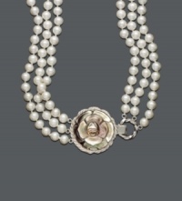 Vintage-inspired romance. A rose-shaped mother-of-pearl pendant does the impossible by making this three-strand freshwater cultured pearl (5-1/2 - 6 mm) necklace even sweeter. Set in sterling silver. Approximate length: 20 inches. Vintage-inspired romance. A rose-shaped mother-of-pearl pendant does the impossible by making this three-strand freshwater cultured pearl (5-1/2 - 6 mm) necklace even sweeter. Set in sterling silver. Approximate length: 20 inches.