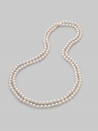 A strand of lustrous white organic pearls goes on and on, down past your waist, to wear long, wrapped or knotted. 8mm white round man-made pearls Length, about 60 Made in Spain A strand of lustrous white organic pearls goes on and on, down past your waist, to wear long, wrapped or knotted. 8mm white round man-made pearls Length, about 60 Made in Spain