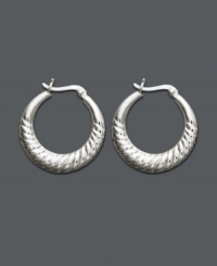 Timeless style to complement every look. Giani Bernini scallop hoops are crafted in polished sterling silver. Approximate diameter: 1 inch. Timeless style to complement every look. Giani Bernini scallop hoops are crafted in polished sterling silver. Approximate diameter: 1 inch.